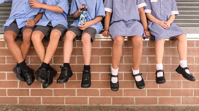 legs of several schoolchildren